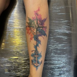 Watercolour compass tattoo
